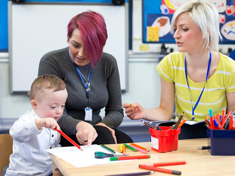 Childcare Two Ladies With Little Boy